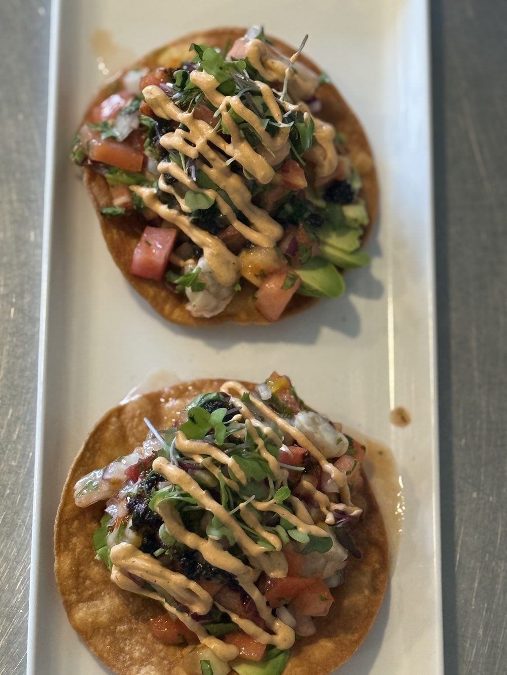 Elegant plated appetizer tacos for catering